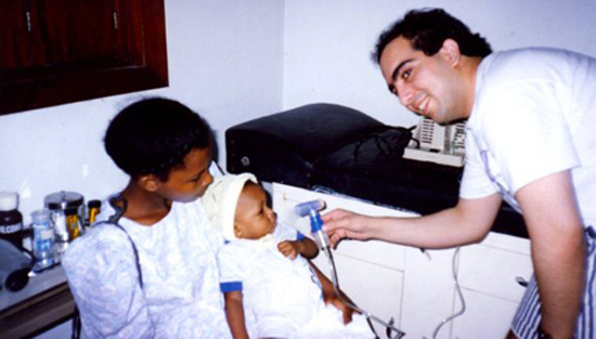 Dr. Manshadi volunteering in Honduras.